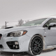 My STI with a good view of the snow-packed Nokian WR-G4 tires.
